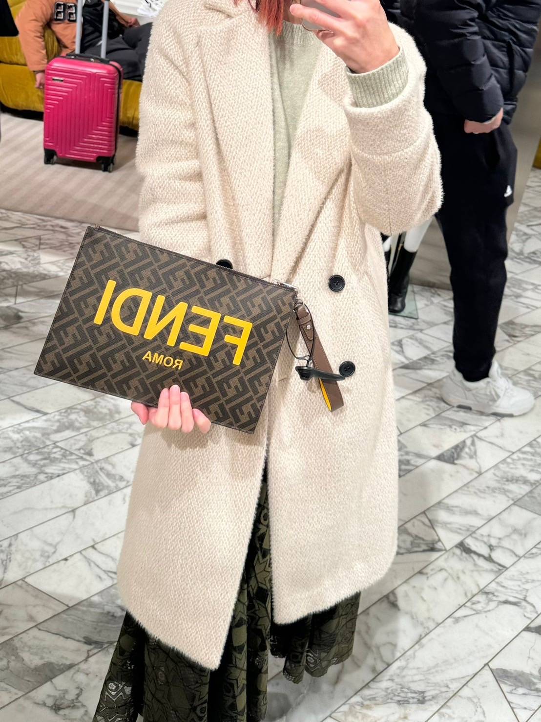 Fendi 經典字母印花織布手拿包